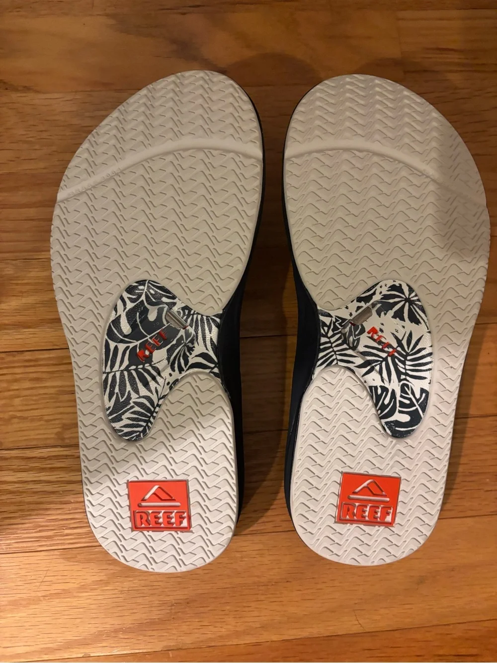 Reef Navy Flip Flops with Orange Logo Accents - Picture 2 of 3
